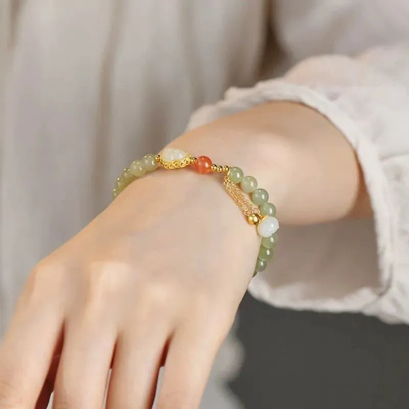 Qingshui jade women's bracelet with gold plated 6mm beads and Chinese fu character