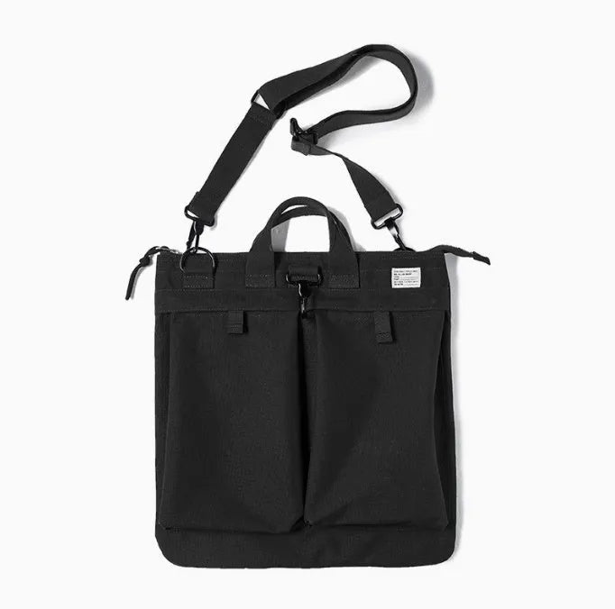 Medium canvas crossbody messenger bag in military green colour with laptop compartment and phone pocket