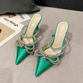 Women's black stiletto heel sandals with silk bandage detail and buckle fastening on a pointed toe