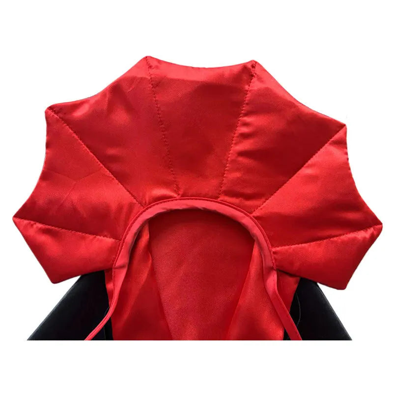 Red Halloween devil cloak and matching pointed hat for a small dog on a white background.