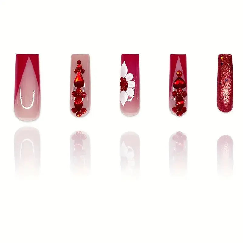 Sweet floral pattern fake nails with red diamond accents in European square long shape