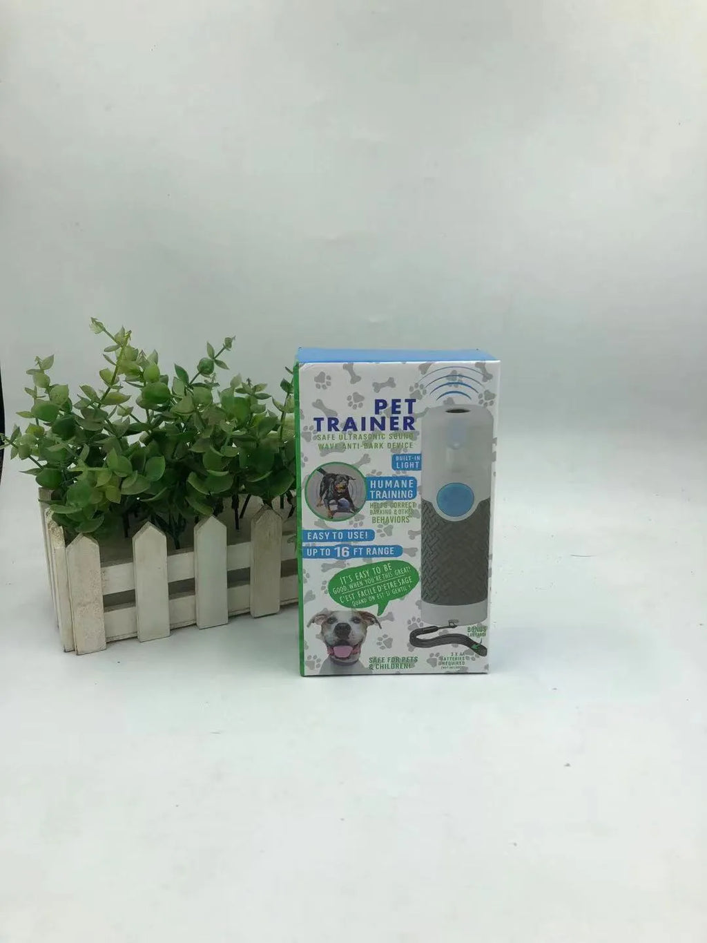 White ABS plastic handheld ultrasonic dog trainer for bark control