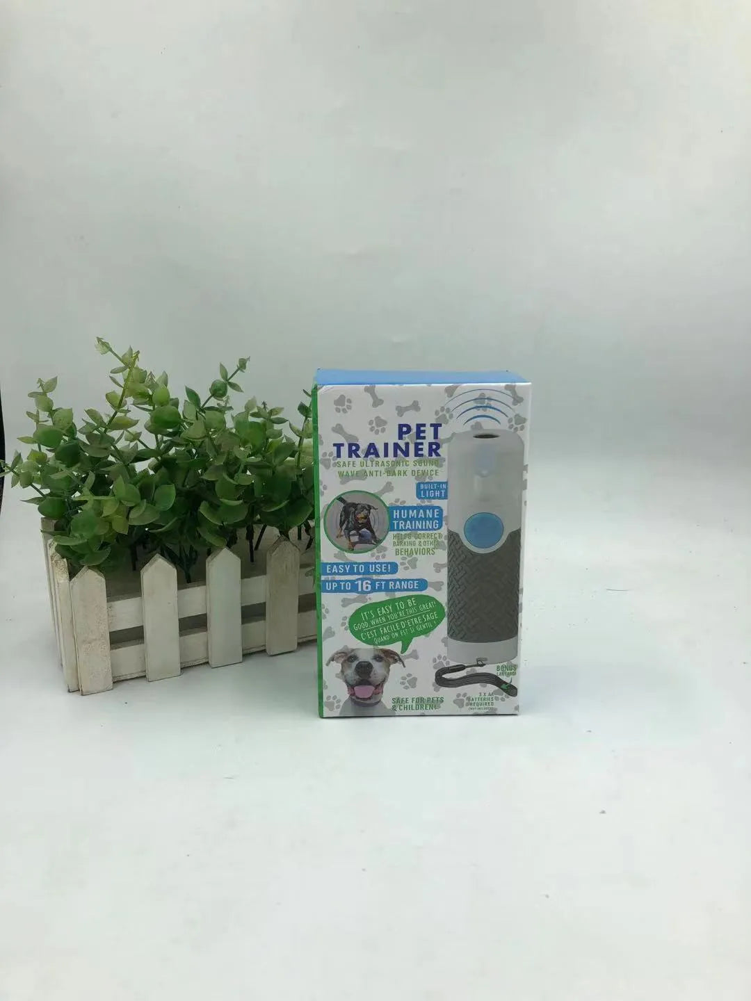 White ABS plastic handheld ultrasonic dog trainer for bark control