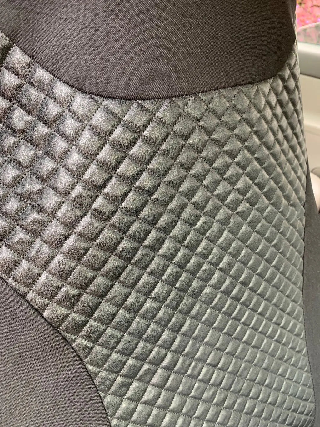 Black quilted automotive seat cover with PU and polyester fabric, plastic hooks