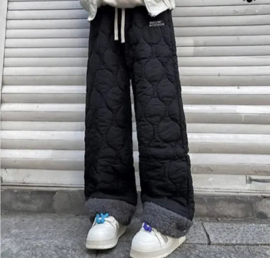 Winter cotton-padded waterproof patchwork lambskin cotton pants in black, side view