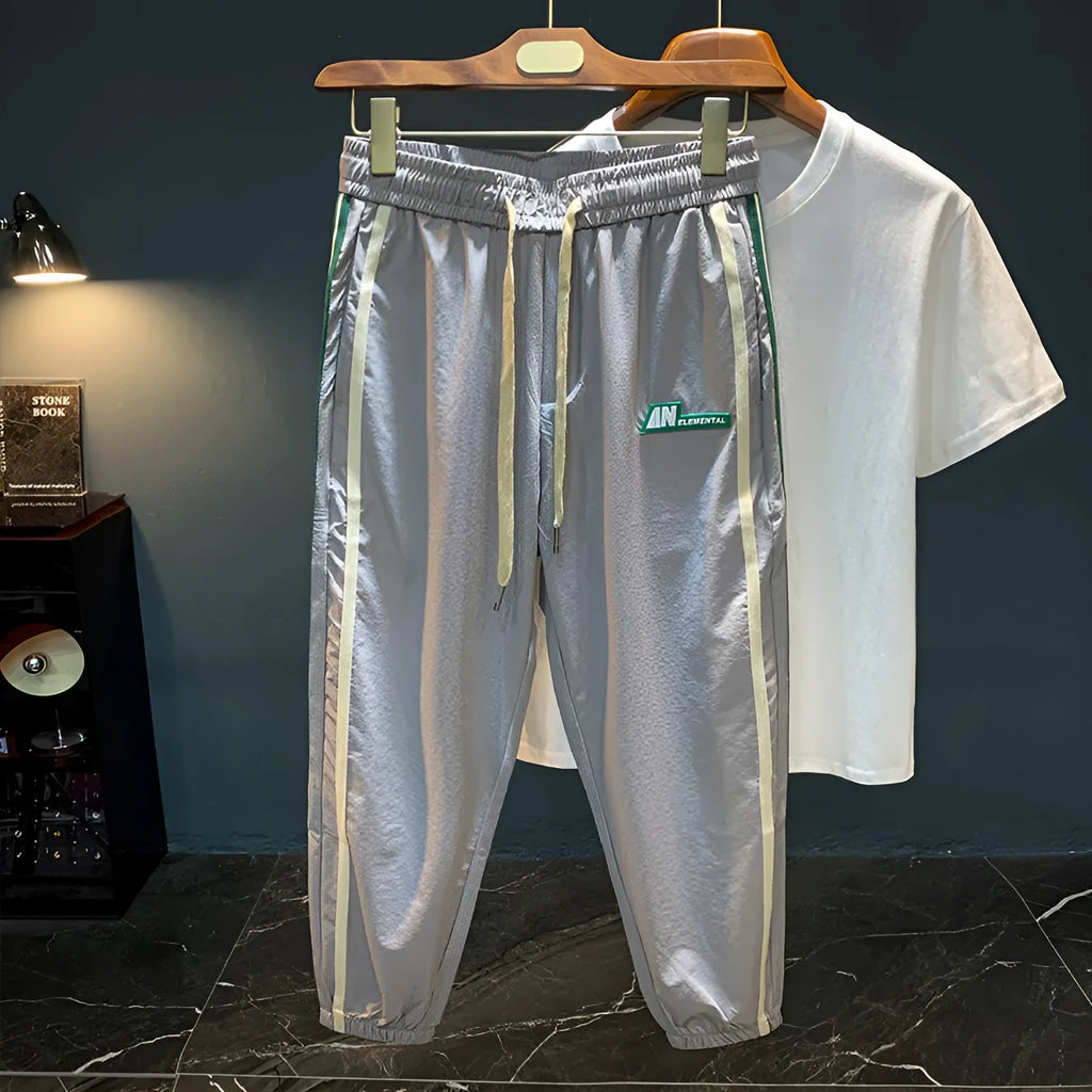 Men's solid colour cotton harem pants in black or grey with mid waist and relaxed fit