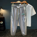 Men's solid colour cotton harem pants in black or grey with mid waist and relaxed fit