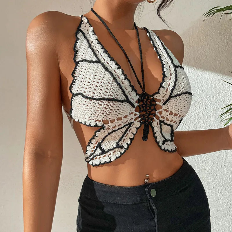 Women's black and white classic bikini swimsuit set on a mannequin.