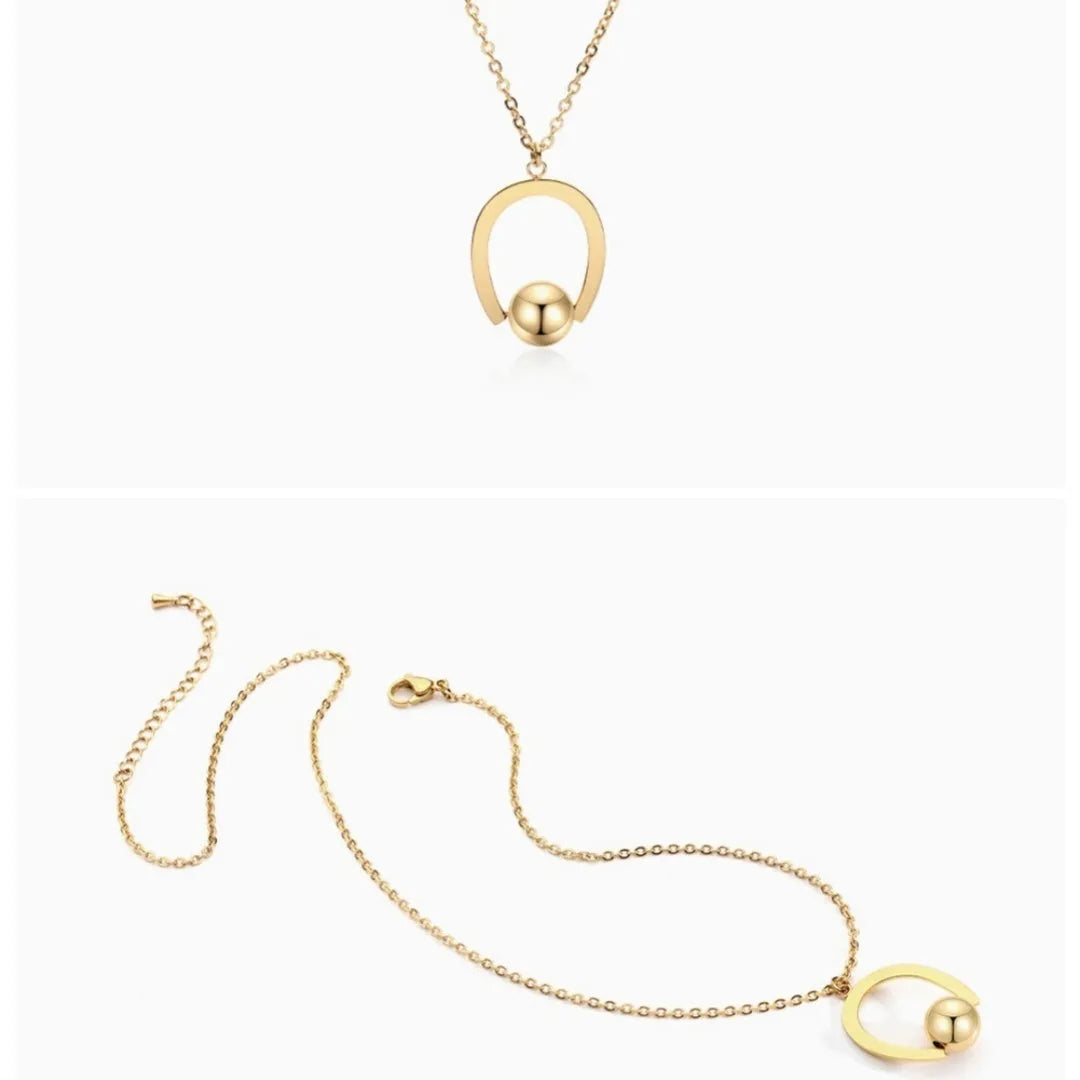 Adjustable stainless steel necklace with geometric pendant on a cross chain, shown in gold colour.