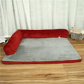 Corduroy dog sofa bed with bolster sides on a wooden floor, showing grey colour option in large size.