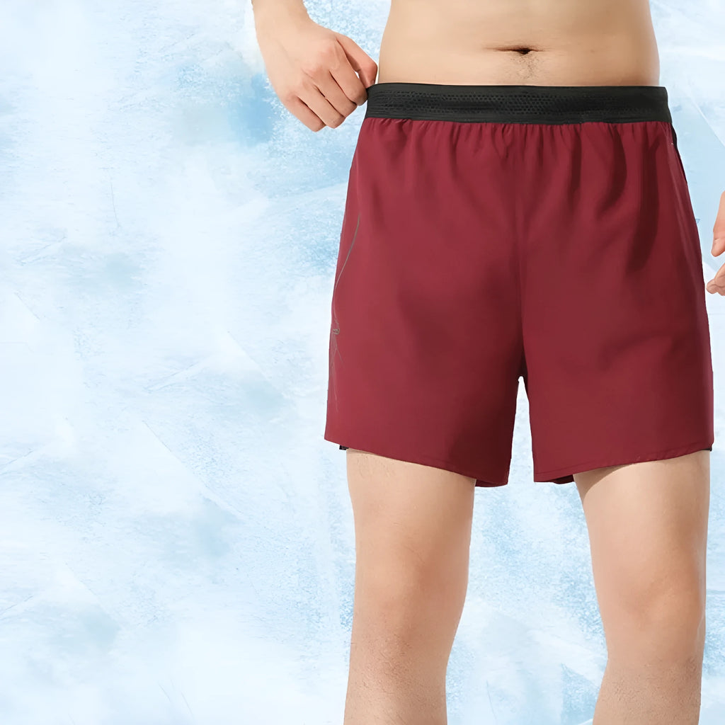 Men's polyester basketball shorts in solid colours with low-waist design