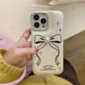Line bow creative drop-resistant TPU phone case for iPhone in Pearl Bow colour option on white background