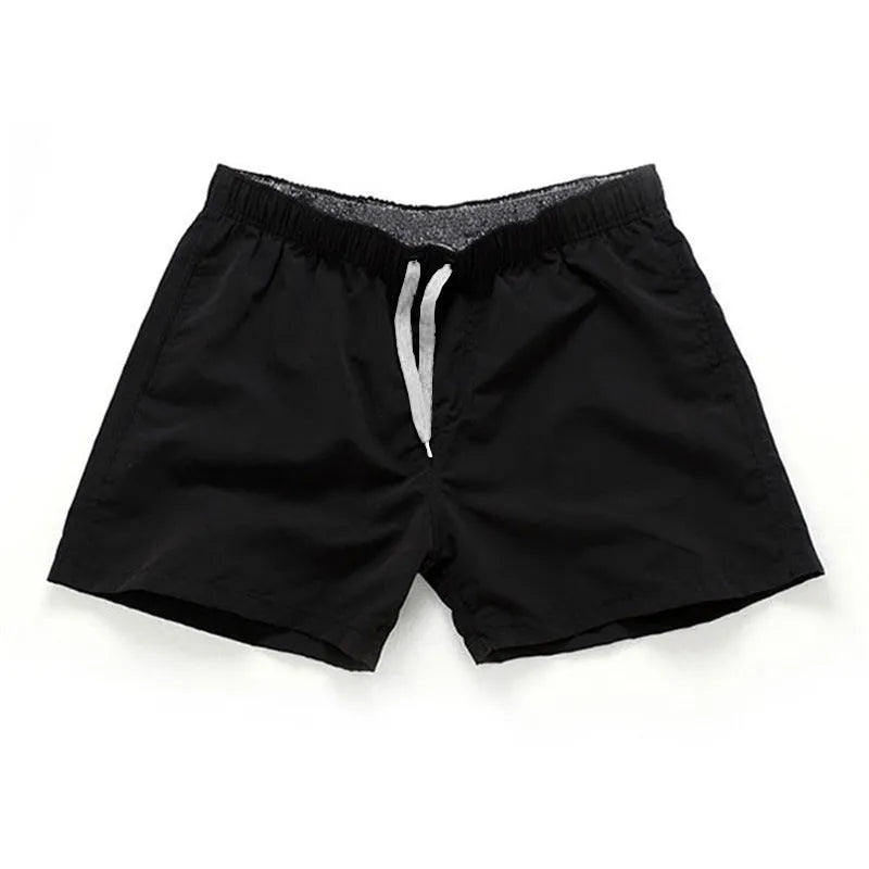 Men's straight-leg beach shorts in polyester fabric, shown in multiple colour options.