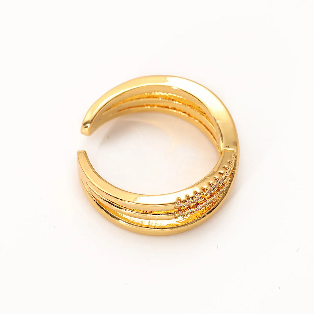 Women's gold open ring with geometric line pattern on copper base