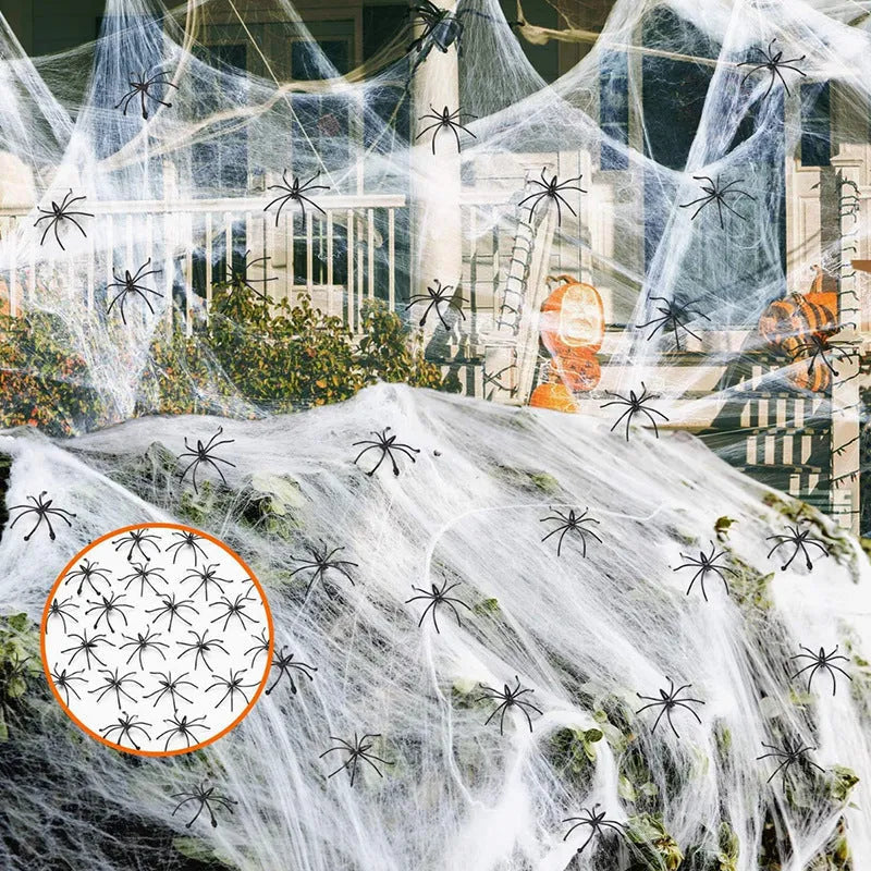 White cotton spider web Halloween decorations showing various weight packages with included plastic spiders