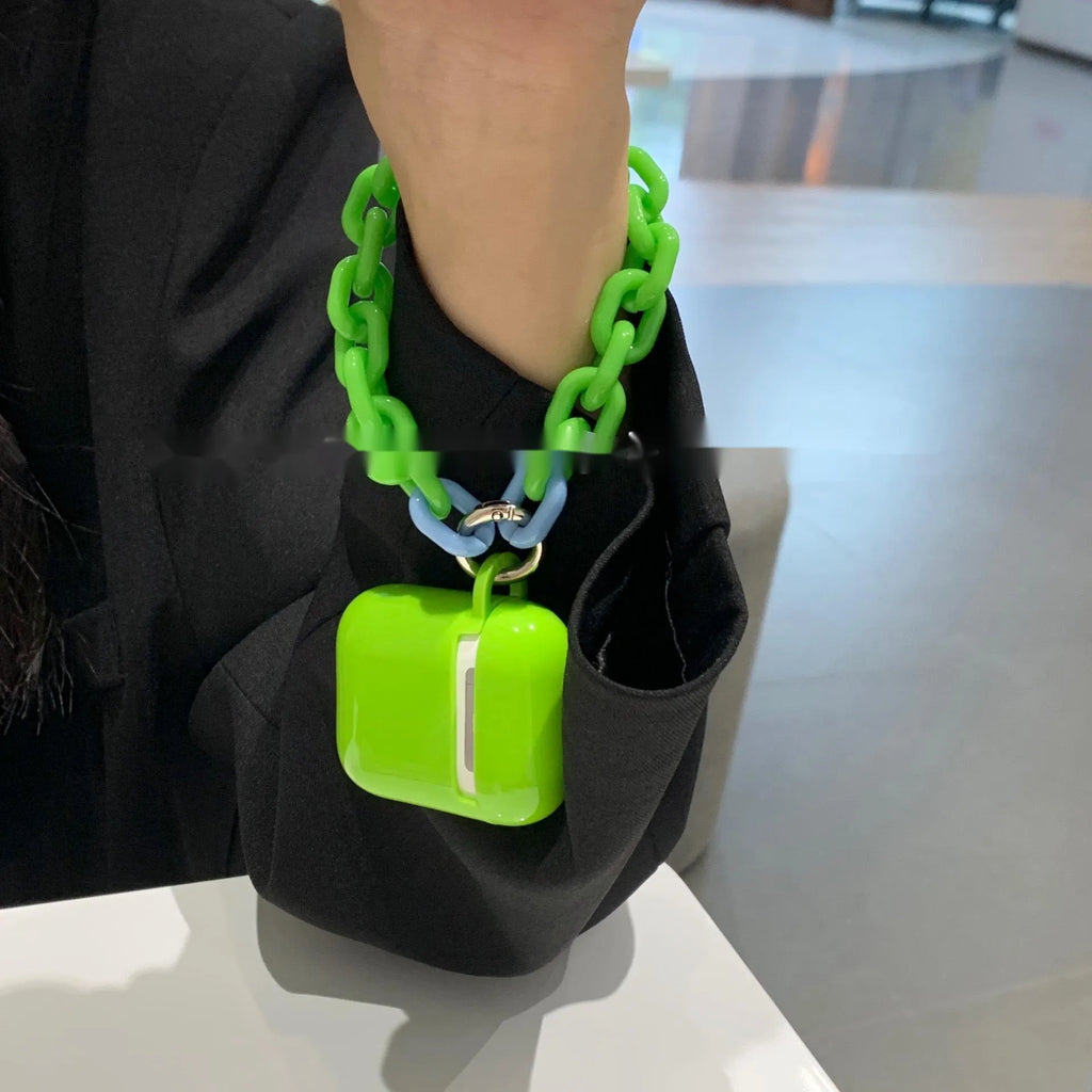 Silicone protective sleeve for AirPods case in green and purple colours with chain earphone shell design