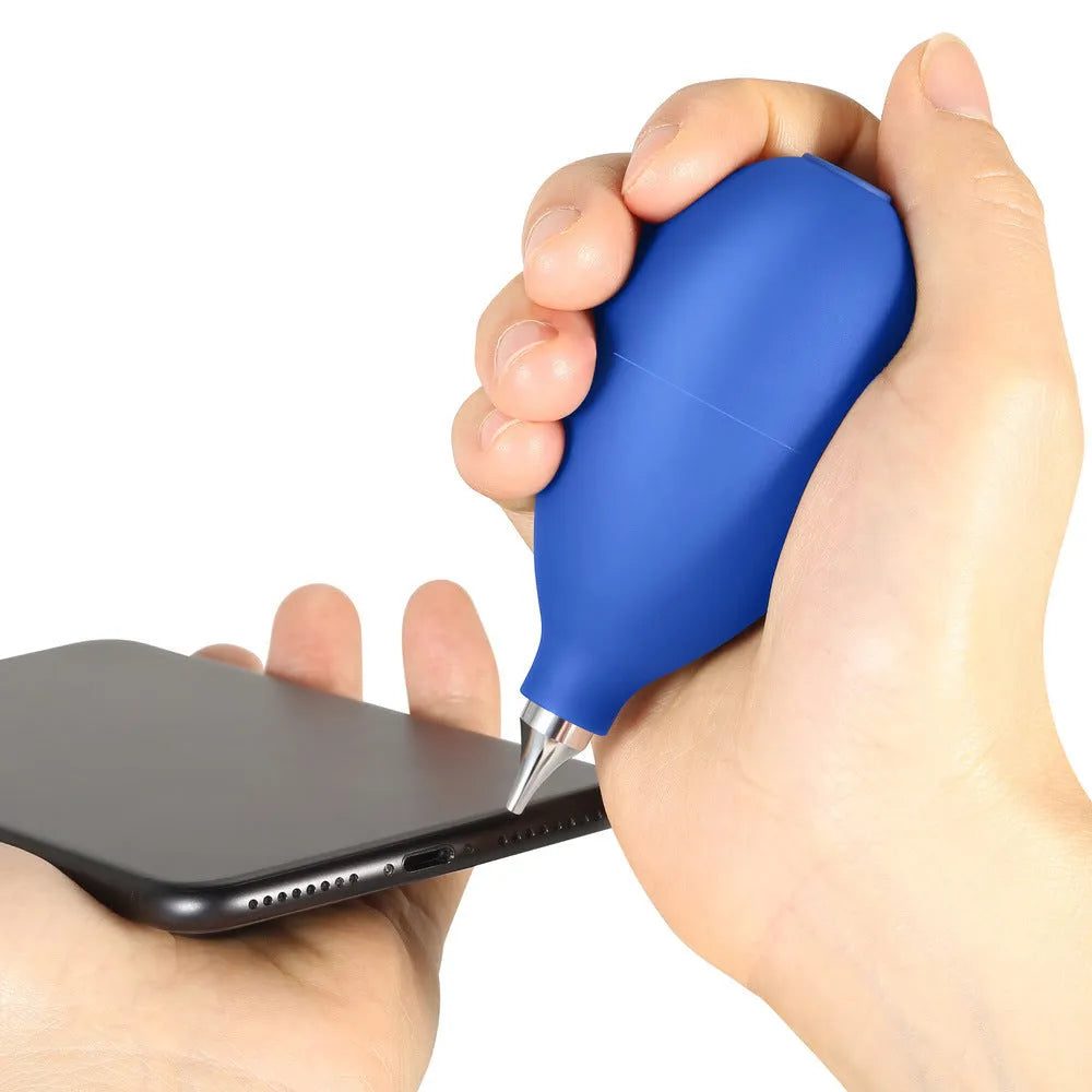 Blue and black handheld rubber dust blower cleaning tool for cameras and electronics.