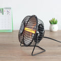 Bakingl Little Sun 4 inch black electric fan heater on a desk with quiet energy-saving operation