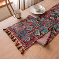 Nordic jacquard table runner with striped pattern and tassel fringe trim in dark blue colour