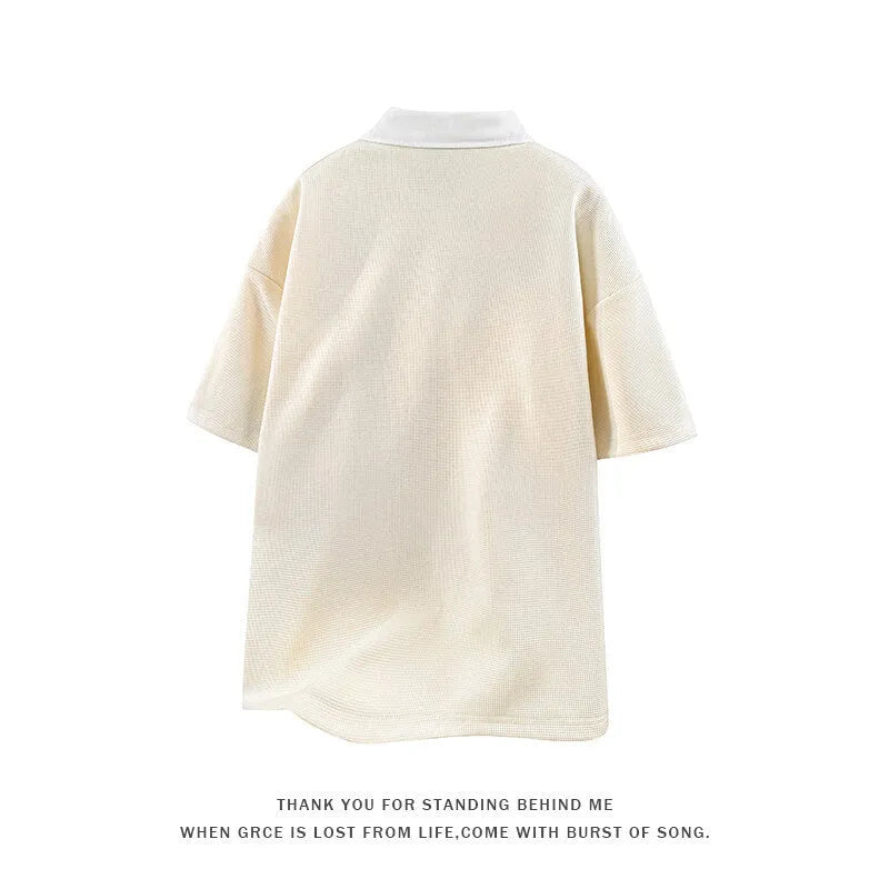 Men's thin black polo shirt sweater with a Henry collar and short sleeves.