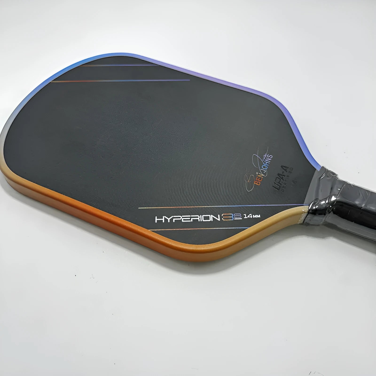 Colour pattern matte finish pickleball racket with T700 carbon fiber construction and honeycomb core.