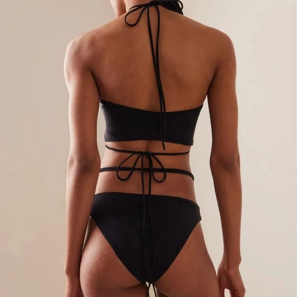 Women's black lace-up bikini swimsuit with adjustable ties and quick-dry fabric
