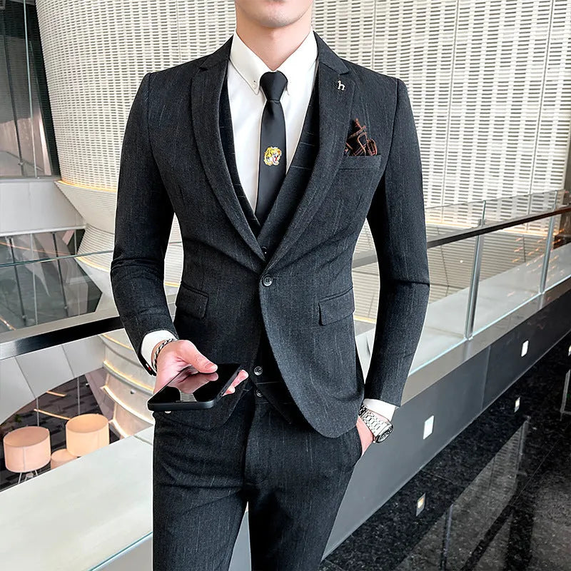 Slim fit men's business suit in black and dark grey options with British style design