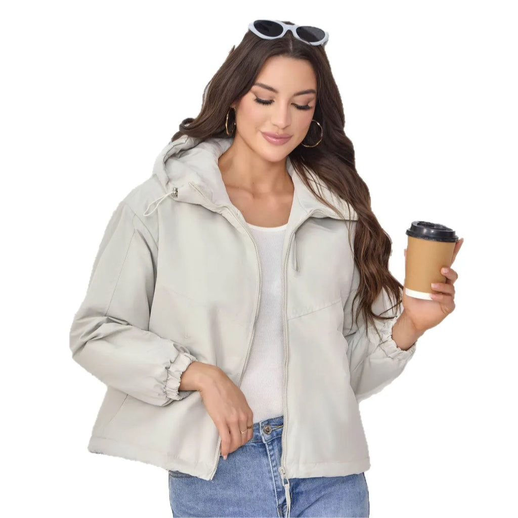 Women's loose fit hooded shell jacket in polyester, shown in grey, black, or purple.
