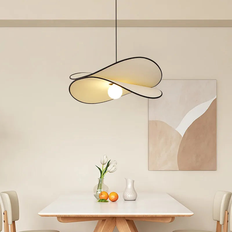 French style fabric potato chip chandelier pendant light in white, shown in a bedroom setting.