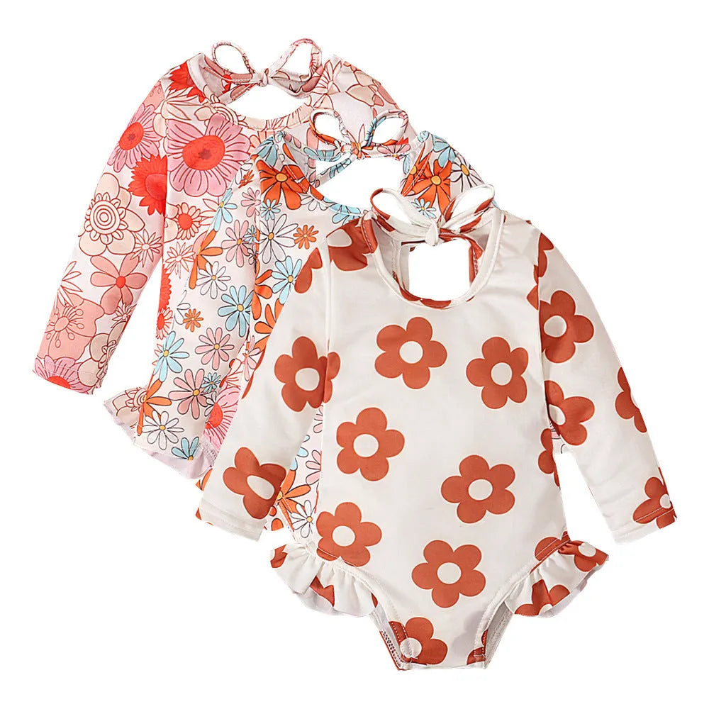 Girl's pattern graphic print crew neck open back swimsuit in orange red with flower design, polyester fabric