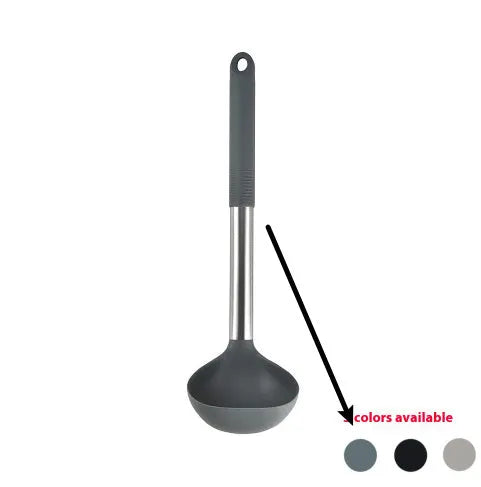 Silicone kitchen utensil set with twelve tools in a rotating white storage caddy on a counter.
