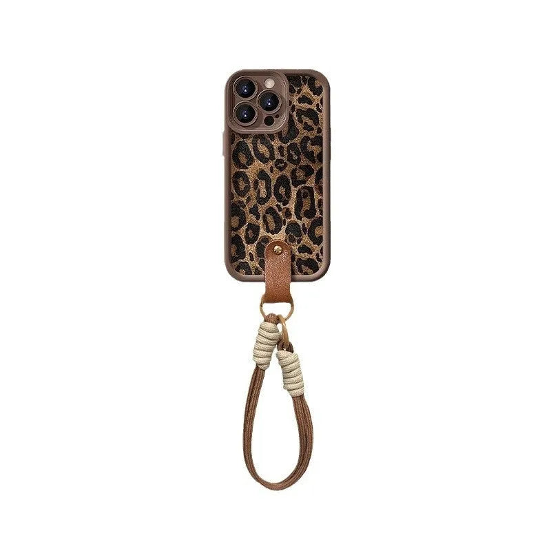 Brown leopard print silicone phone case for iPhone with an attached white lanyard strap.
