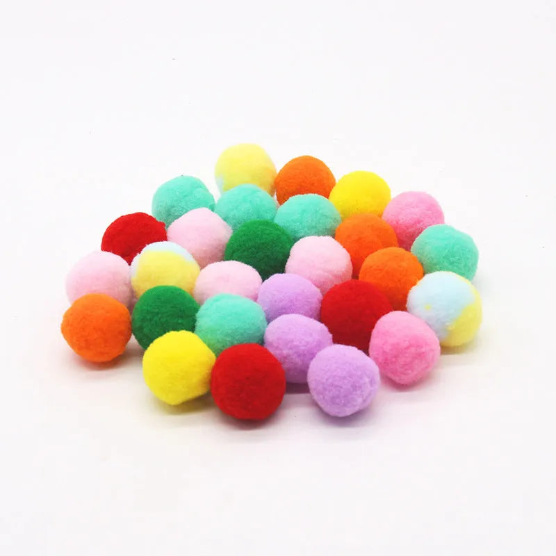 Plush pet toy gun with colourful yarn balls for interactive cat and dog play sessions