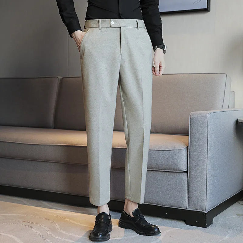 Men's straight cut brown corduroy trousers with elastic waistband shown front and side view
