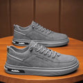 Men's waterproof casual shoes in khaki with a round toe, low-top design, and a non-slip rubber sole.