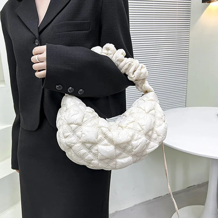 Light beige women's casual nylon shoulder messenger bag with a long adjustable strap.