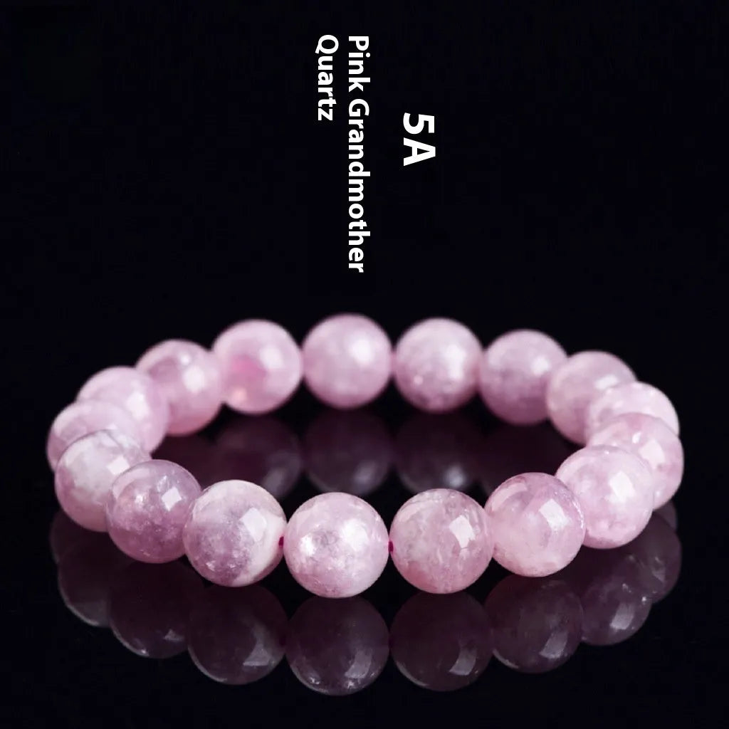 Grandmother Crystal bracelet with polished geometric beads in 5A purple on a white background.