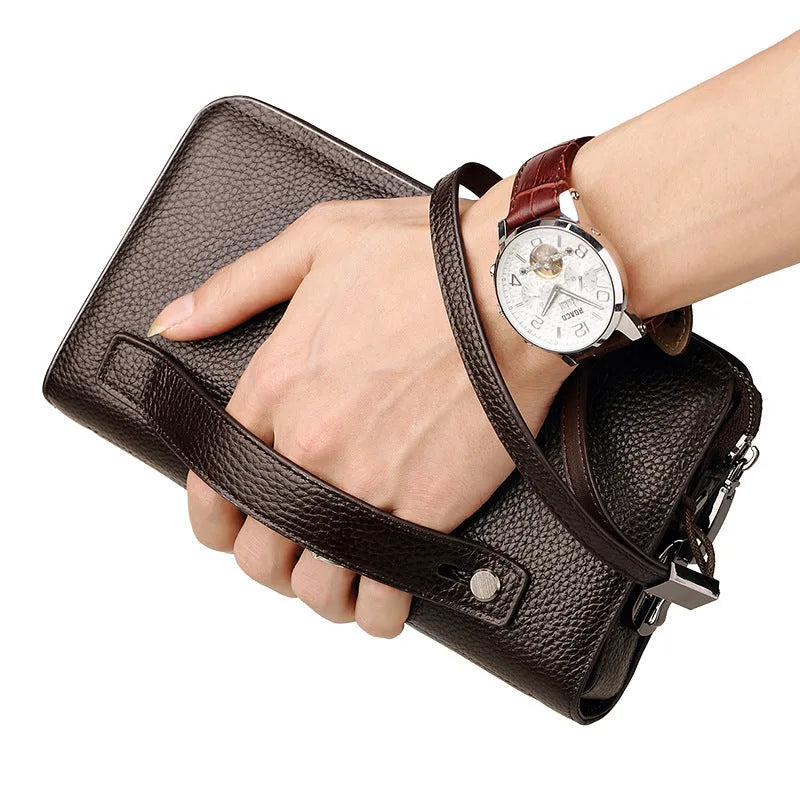 Men's genuine leather clutch wallet with litchi pattern embossing, anti-theft sandwich pocket, and removable handle in black