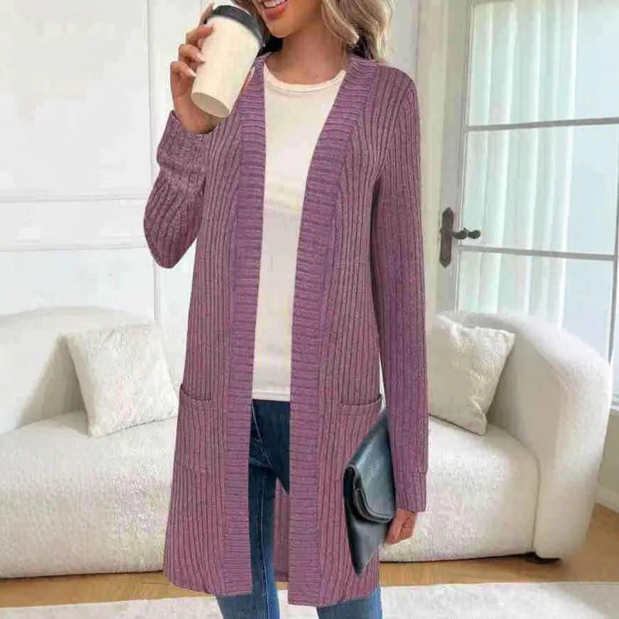 Long sleeve loose-fit knitted cardigan jacket with pockets in wine red colour.