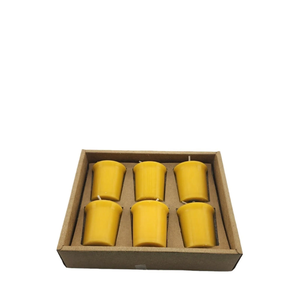 Six handmade beeswax and soy wax candles in cup shape, beeswax colour, 4.6cm x 5.2cm each, arranged on a surface