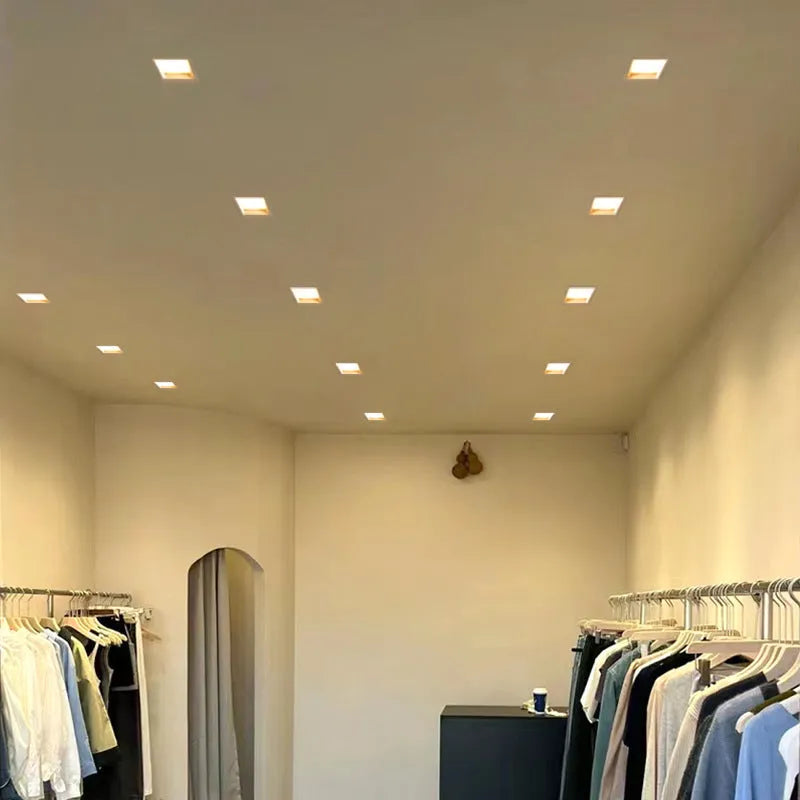 LED ultra-thin square downlight recessed in ceiling grid grille, aluminium shell, side view of flush mount installation