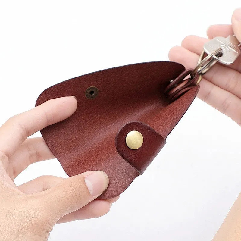 Genuine leather car key case in four colour options showing multifunctional storage design