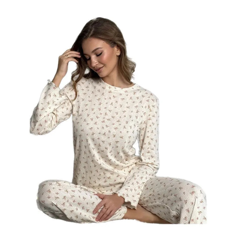 Women's white floral print two-piece suit with bell sleeve top and wide leg pants