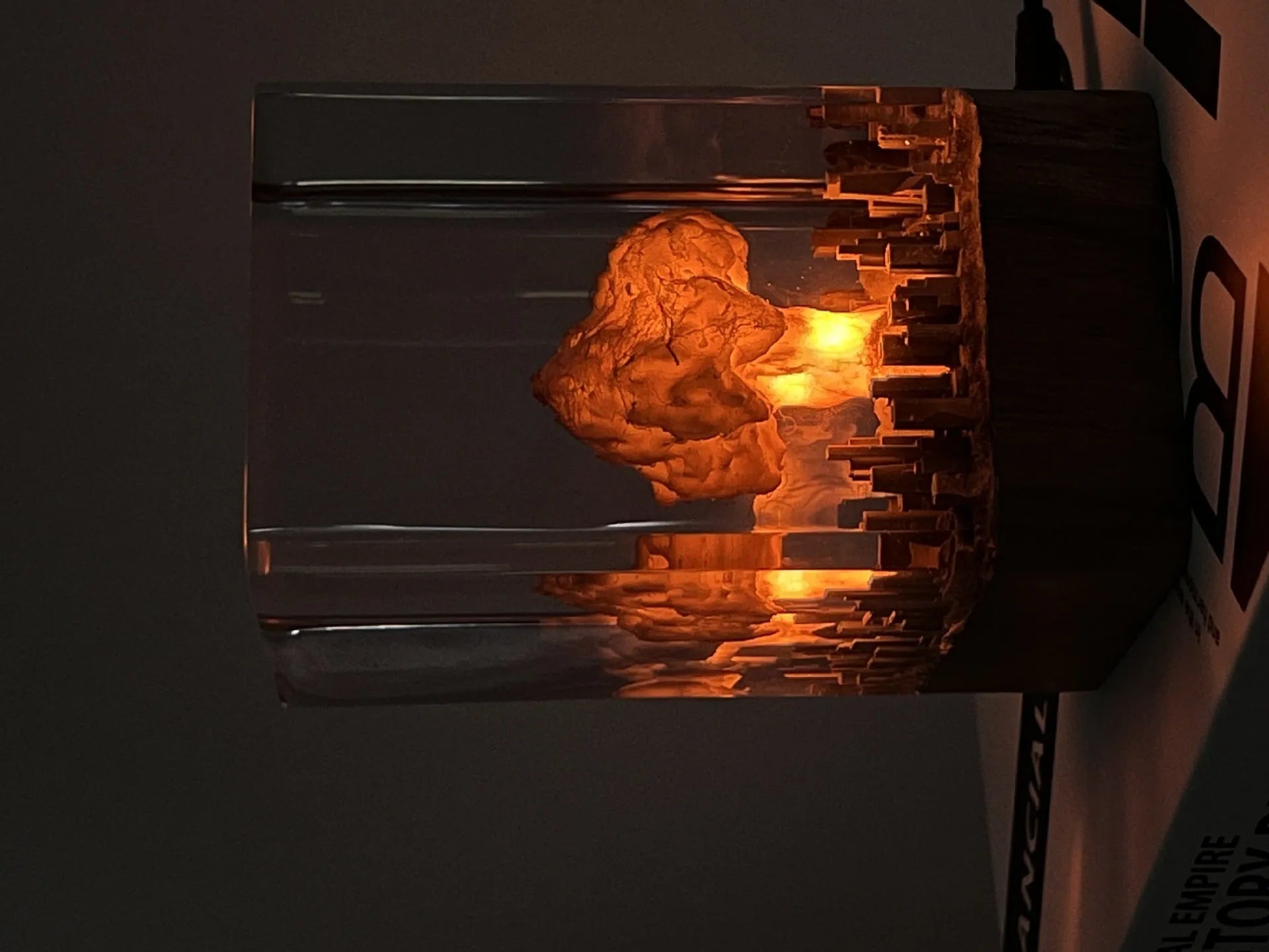 Small resin night lamp shaped like an atomic bomb mushroom cloud in modern simplicity style.