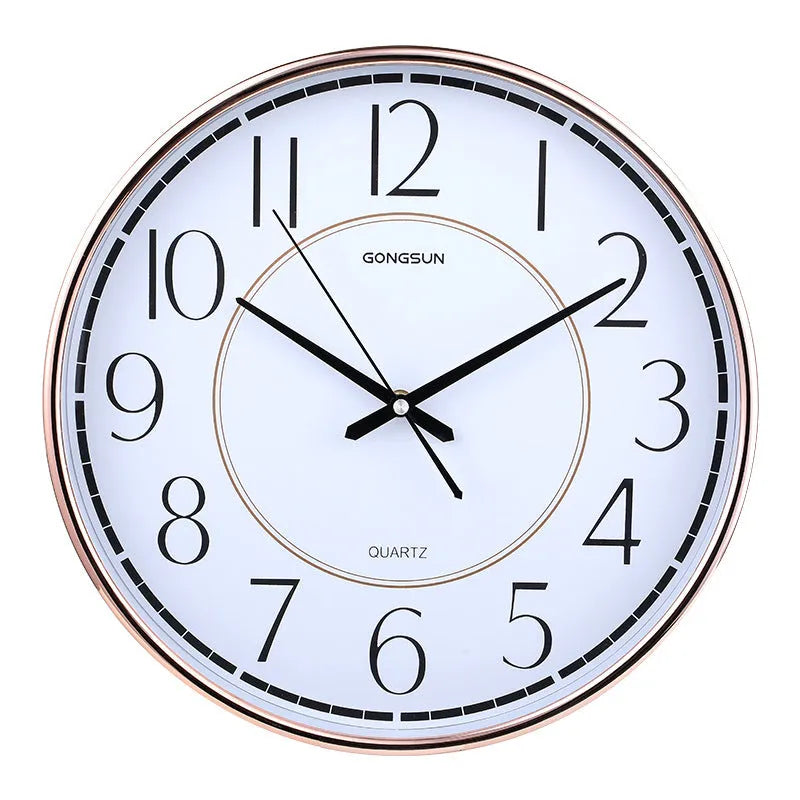 14-inch round wall clock with white face, black numbers, and sweep second movement on a light wall