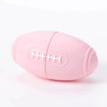 Blue silicone rugby ball dog toy with hollow centre for treat dispensing