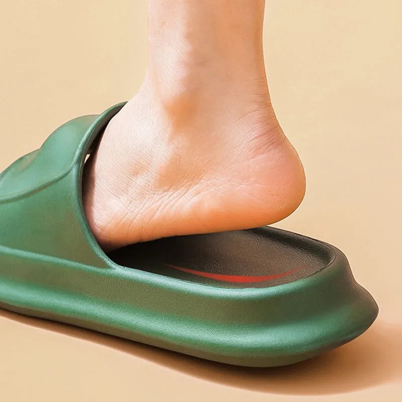 Pair of thick-soled EVA flip-flop slippers in a chosen colour on a plain background.