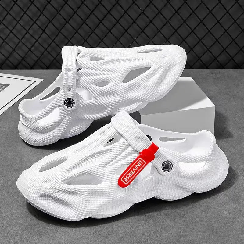 Coconut slippers in EVA foam with closed toe design and textured surface in grey colour