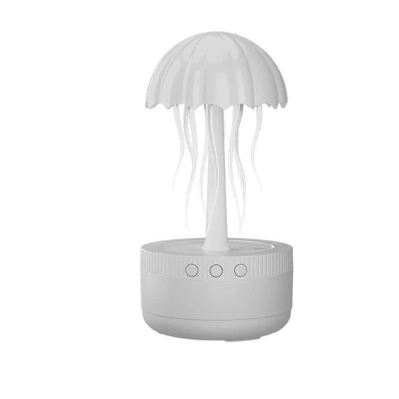 White USB rotating colorful light humidifier with large mist output on a desktop surface