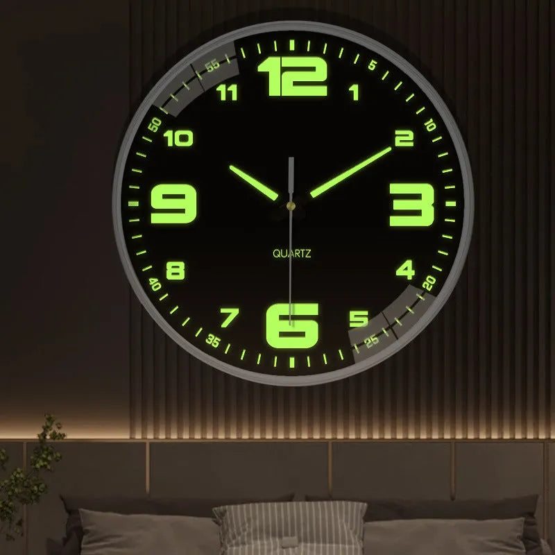 Modern 8-inch luminous wall clock with white face and black numbers on a wall.